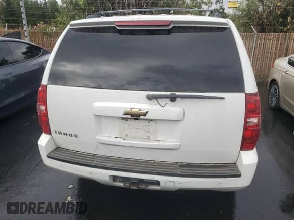 2007 Chevrolet Tahoe LTZ with VIN 1GNFK13067R104575, listed as a Copart auction lot 82212005 with 166,131 mi miles and Salvage title. Bid and sale history available at DreamBid. Image 6.