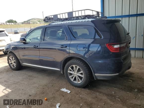 2014 Dodge Durango Limited with VIN 1C4SDJDT9EC323265, listed as a Copart auction lot 66514135 with 176,978 mi miles and Salvage title. Bid and sale history available at DreamBid. Image 2.