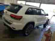 2021 Jeep Grand Cherokee Trailhawk z VIN 1C4RJFLG0MC868410, wystawiony jako Copart lot #63120925 z przebiegiem 140 986 mil mil oraz Czysty tytuł • Clean title. Historia ofert i sprzedaży dostępna na DreamBid. Obrazek 3.