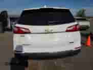 2018 Chevrolet Equinox Premier z VIN 2GNAXMEV4J6187139, wystawiony jako Copart lot #64096875 z przebiegiem 138 300 mil mil oraz Szkoda całkowita • Salvage title. Historia ofert i sprzedaży dostępna na DreamBid. Obrazek 6.