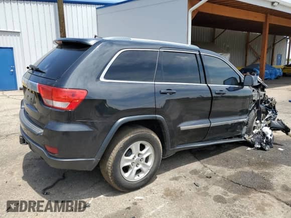 2012 Jeep Grand Cherokee Laredo с VIN 1C4RJEAT6CC301188, выставлен на аукционе Copart как лот 59602325 с пробегом 163 126 миль миль и Списание • Salvage title. История ставок и продаж доступна на DreamBid. Изображение 3.