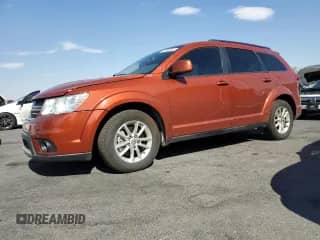 2013 Dodge Journey SXT with VIN 3C4PDCBB9DT729660, listed as a Copart auction lot 67589065 with 168,634 mi miles and Salvage title. Bid and sale history available at DreamBid. Image 1.