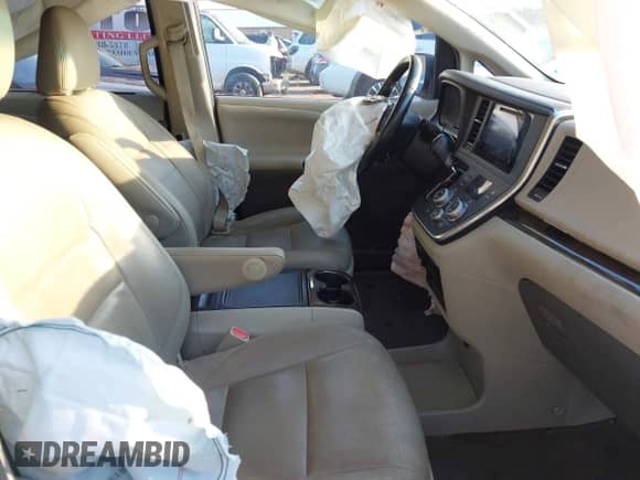 2015 Toyota Sienna XLE with VIN 5TDYK3DC5FS644523, listed as a IAAI auction lot 43248015 with 106,854 mi miles and . Bid and sale history available at DreamBid. Image 5.