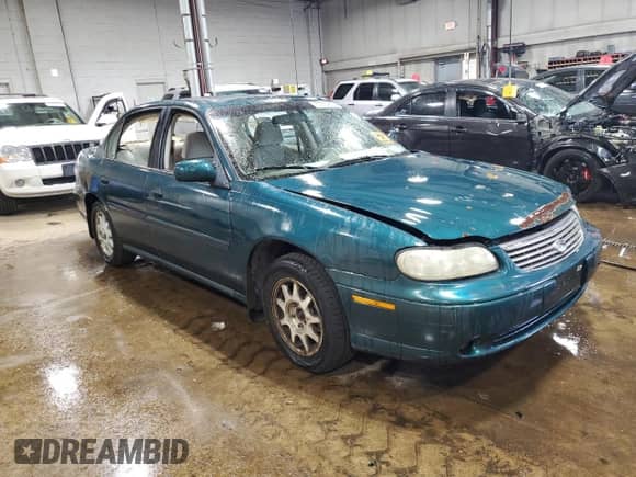 1998 Chevrolet Malibu LS с VIN 1G1NE52MXW6193681, выставлен на аукционе Copart как лот 61834655 с пробегом 174 015 миль миль и Списание • Salvage title. История ставок и продаж доступна на DreamBid. Изображение 4.