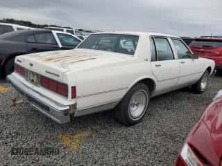 1987 Chevrolet Caprice Classic с VIN 1G1BN51H9H9155948, выставлен на аукционе Copart как лот 83097554 с пробегом 198 984 миль миль и На запчасти • Non repairable. История ставок и продаж доступна на DreamBid. Изображение 3.