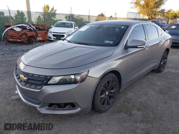 2018 Chevrolet Impala LT z VIN 1G1105S31JU108736, wystawiony jako IAAI lot #43478113 z przebiegiem 134 000 mil mil oraz . Historia ofert i sprzedaży dostępna na DreamBid. Obrazek 2.
