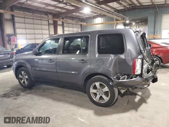 2014 Honda Pilot EX-L with VIN 5FNYF4H57EB008792, listed as a Copart auction lot 80823265 with 208,875 mi miles and Salvage title. Bid and sale history available at DreamBid. Image 2.