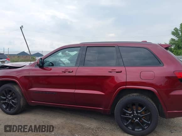 2020 Jeep Grand Cherokee Altitude with VIN 1C4RJFAG0LC233091, listed as a IAAI auction lot 42706976 with 66,255 mi miles and . Bid and sale history available at DreamBid. Image 14.