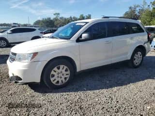 2015 Dodge Journey SE with VIN 3C4PDCAB9FT713785, listed as a Copart auction lot 84352205 with 96,110 mi miles and Salvage title. Bid and sale history available at DreamBid. Image 1.