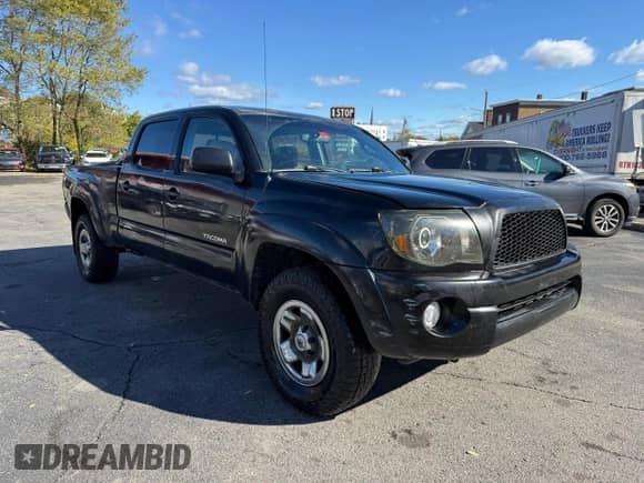 2006 Toyota Tacoma z VIN 5TEMU52N46Z270160, wystawiony jako Copart lot #90673945 z przebiegiem 185 425 mil mil oraz Czysty tytuł • Clean title. Historia ofert i sprzedaży dostępna na DreamBid. Obrazek 4.