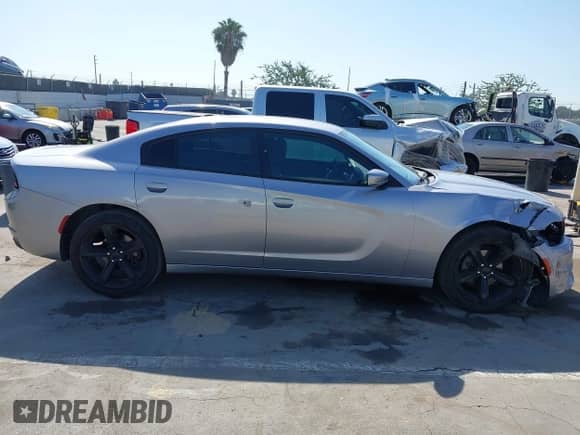 2015 Dodge Charger SE z VIN 2C3CDXBG4FH741166, wystawiony jako IAAI lot #43476866 z przebiegiem 169 680 mil mil oraz . Historia ofert i sprzedaży dostępna na DreamBid. Obrazek 13.