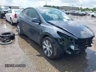 2023 Tesla Model Y Long Range z VIN 7SAYGDEE4PA096821, wystawiony jako IAAI lot #42694922 z przebiegiem 29 156 mil mil oraz . Historia ofert i sprzedaży dostępna na DreamBid. Obrazek 1.