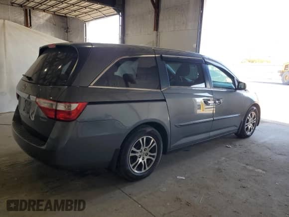 2013 Honda Odyssey EX с VIN 5FNRL5H40DB026656, выставлен на аукционе Copart как лот 82706175 с пробегом 167 669 миль миль и Чистый • Clean title. История ставок и продаж доступна на DreamBid. Изображение 3.