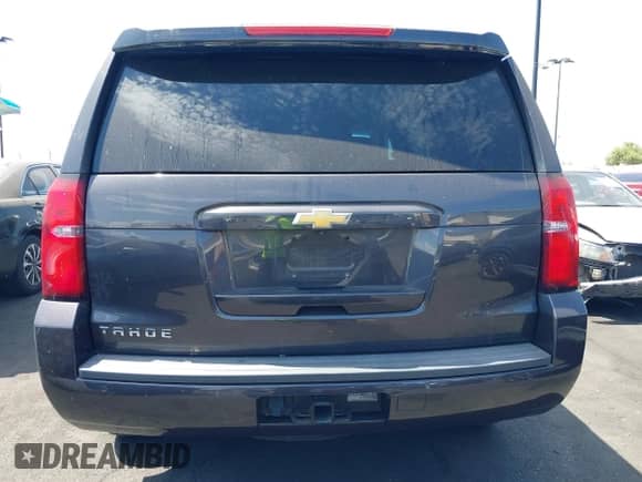 2015 Chevrolet Tahoe LS z VIN 1GNSCAKC0FR742276, wystawiony jako IAAI lot #43052060 z przebiegiem 58 077 mil mil oraz . Historia ofert i sprzedaży dostępna na DreamBid. Obrazek 17.