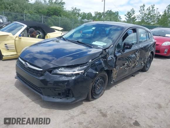 2020 Subaru Impreza with VIN 4S3GTAB64L3704251, listed as a IAAI auction lot 42330314 with 68,498 mi miles and . Bid and sale history available at DreamBid. Image 2.