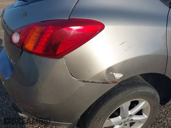 2009 Nissan Murano LE z VIN JN8AZ18W79W151778, wystawiony jako IAAI lot #43060074 z przebiegiem 157 411 mil mil oraz . Historia ofert i sprzedaży dostępna na DreamBid. Obrazek 6.