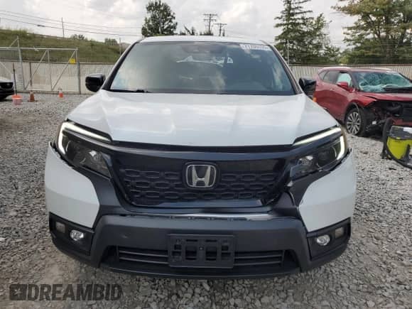 2020 Honda Passport EX-L with VIN 5FNYF8H50LB016902, listed as a Copart auction lot 71705155 with 38,436 mi miles and Salvage title. Bid and sale history available at DreamBid. Image 5.