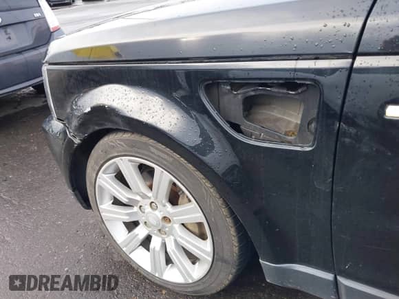 2007 Land Rover Range Rover Sport SC z VIN SALSH23497A111915, wystawiony jako IAAI lot #41491636 z przebiegiem 153 924 mil mil oraz . Historia ofert i sprzedaży dostępna na DreamBid. Obrazek 13.