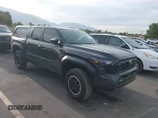 2024 Toyota Tacoma TRD Off Road with VIN 3TMLB5JN8RM009103, listed as a IAAI auction lot 43210758 with 14,193 mi miles and . Bid and sale history available at DreamBid. Image 1.
