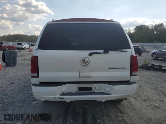 2004 Cadillac Escalade z VIN 1GYEK63N24R189742, wystawiony jako Copart lot #80224225 z przebiegiem Nie podano mil oraz Szkoda całkowita • Salvage title. Historia ofert i sprzedaży dostępna na DreamBid. Obrazek 6.