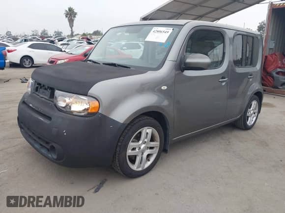 2009 Nissan Cube SL с VIN JN8AZ28R89T108472, выставлен на аукционе IAAI как лот 42806549 с пробегом 125 170 миль миль и . История ставок и продаж доступна на DreamBid. Изображение 2.