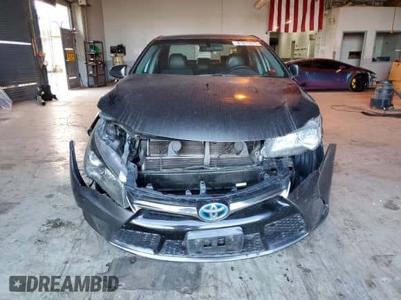 2017 Toyota Camry Hybrid LE z VIN 4T1BD1FK8HU214858, wystawiony jako Copart lot #81819275 z przebiegiem 242 434 mil mil oraz Szkoda całkowita • Salvage title. Historia ofert i sprzedaży dostępna na DreamBid. Obrazek 5.