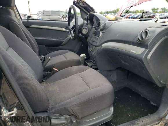 2009 Chevrolet Aveo 1LT с VIN KL1TD56E89B602784, выставлен на аукционе Copart как лот 68482665 с пробегом Не указан миль и Списание • Salvage title. История ставок и продаж доступна на DreamBid. Изображение 8.