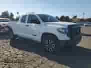 2019 Toyota Tundra SR с VIN 5TFUM5F10KX079800, выставлен на аукционе Copart как лот 81719915 с пробегом 94 928 миль миль и Списание • Salvage title. История ставок и продаж доступна на DreamBid. Изображение 4.