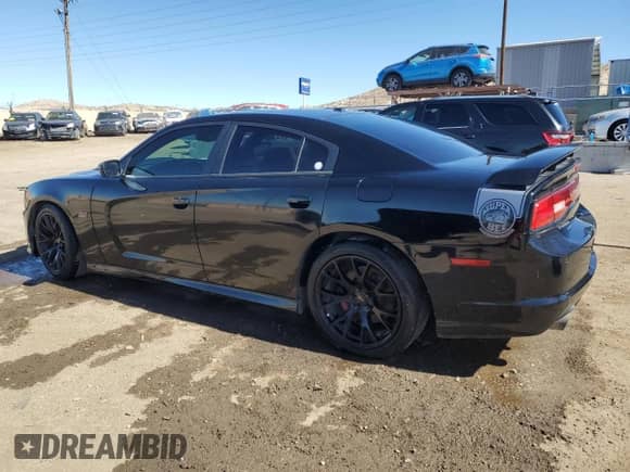 2013 Dodge Charger SRT-8 Super Bee z VIN 2C3CDXGJ6DH563858, wystawiony jako Copart lot #44337315 z przebiegiem 127 716 mil mil oraz Szkoda całkowita • Salvage title. Historia ofert i sprzedaży dostępna na DreamBid. Obrazek 2.