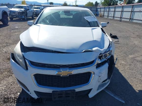 2015 Chevrolet Malibu LT z VIN 1G11C5SL6FF271577, wystawiony jako IAAI lot #43441330 z przebiegiem 159 952 mil mil oraz . Historia ofert i sprzedaży dostępna na DreamBid. Obrazek 12.