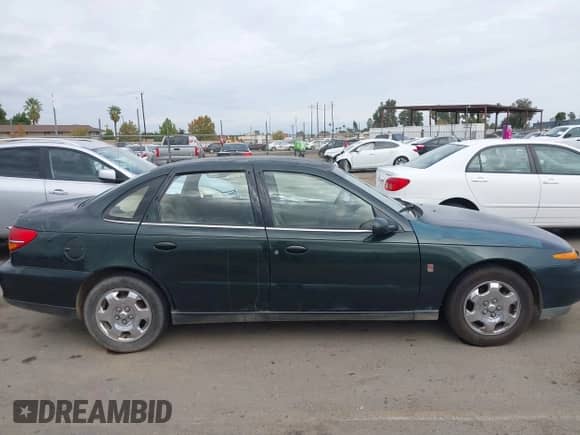 2000 Saturn LS z VIN 1G8JU52F1YY651684, wystawiony jako IAAI lot #43342271 z przebiegiem 329 804 mil mil oraz . Historia ofert i sprzedaży dostępna na DreamBid. Obrazek 14.