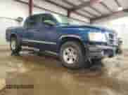 2008 Dodge Dakota Laramie with VIN 1D7HW58N08S636891, listed as a Copart auction lot 87449075 with 124,959 mi miles and Salvage title. Bid and sale history available at DreamBid. Image 4.
