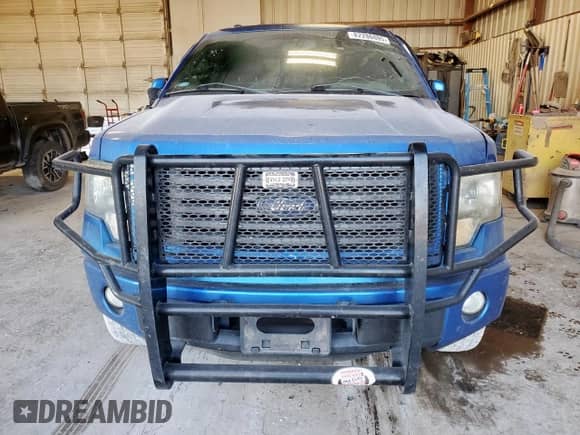 2012 Ford F-150 Lariat with VIN 1FTFW1CF6CKD04229, listed as a Copart auction lot 82286095 with 177,876 mi miles and Salvage title. Bid and sale history available at DreamBid. Image 5.