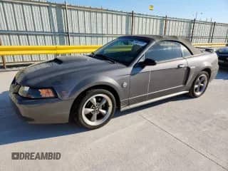 2004 Ford Mustang GT Deluxe с VIN 1FAFP45X24F122936, выставлен на аукционе Copart как лот 81607885 с пробегом 129 898 миль миль и Чистый • Clean title. История ставок и продаж доступна на DreamBid. Изображение 1.