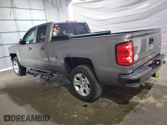 2017 Chevrolet Silverado 1500 LT with VIN 1GCVKREH4HZ249881, listed as a Copart auction lot 62936765 with 71,091 mi miles and Salvage title. Bid and sale history available at DreamBid. Image 2.