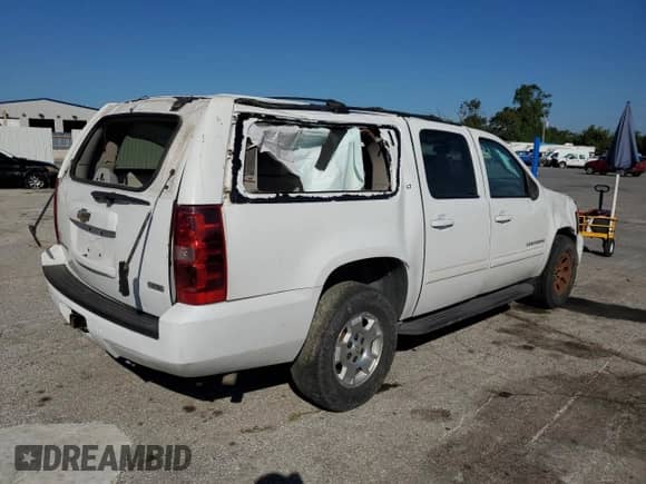 2011 Chevrolet Suburban LT с VIN 1GNSKJE38BR345925, выставлен на аукционе Copart как лот 67606975 с пробегом 193 101 миль миль и Списание • Salvage title. История ставок и продаж доступна на DreamBid. Изображение 3.