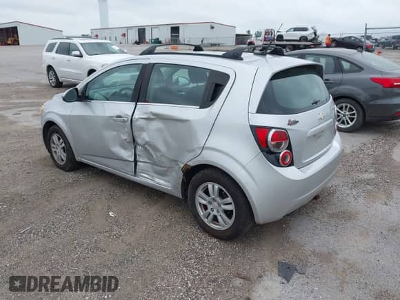 2012 Chevrolet Sonic LT with VIN 1G1JD6SBXC4214090, listed as a IAAI auction lot 42793504 with 152,185 mi miles and . Bid and sale history available at DreamBid. Image 3.