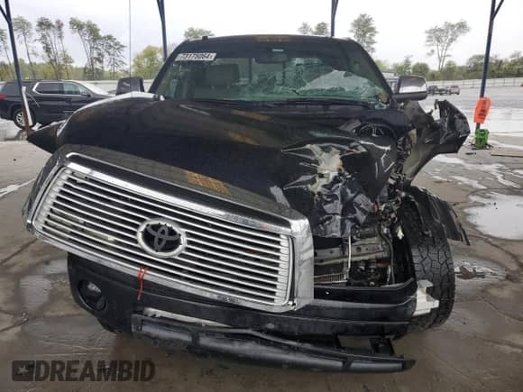 2012 Toyota Tundra Limited z VIN 5TFSY5F16CX118662, wystawiony jako Copart lot #73175064 z przebiegiem Nie podano mil oraz Szkoda całkowita • Salvage title. Historia ofert i sprzedaży dostępna na DreamBid. Obrazek 5.