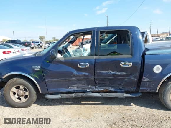 2003 Ford F-150 XLT z VIN 1FTRW07663KD61130, wystawiony jako IAAI lot #43331769 z przebiegiem 161 343 mil mil oraz . Historia ofert i sprzedaży dostępna na DreamBid. Obrazek 6.