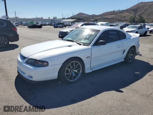 1998 Ford Mustang GT z VIN 1FAFP42X9WF179805, wystawiony jako Copart lot #82494395 z przebiegiem 142 724 mil mil oraz Szkoda całkowita • Salvage title. Historia ofert i sprzedaży dostępna na DreamBid. Obrazek 1.