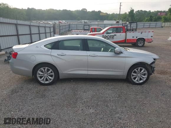 2018 Chevrolet Impala LT z VIN 1G1105SA8JU143854, wystawiony jako IAAI lot #42113667 z przebiegiem 82 799 mil mil oraz . Historia ofert i sprzedaży dostępna na DreamBid. Obrazek 14.