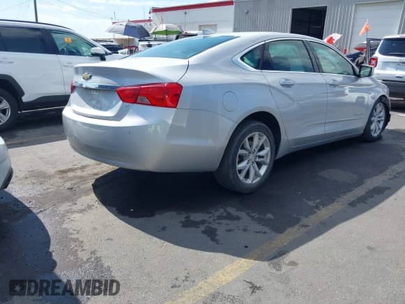 2016 Chevrolet Impala LT z VIN 2G1105SA8G9138532, wystawiony jako IAAI lot #43269051 z przebiegiem 141 773 mil mil oraz . Historia ofert i sprzedaży dostępna na DreamBid. Obrazek 4.