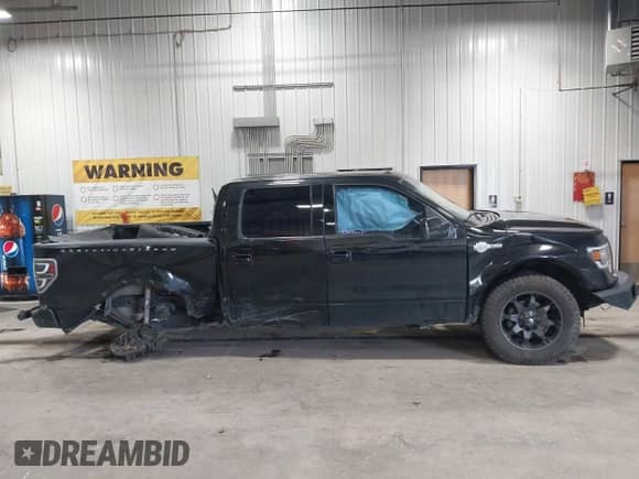 2012 Ford F-150 Lariat with VIN 1FTFW1E69CFB77241, listed as a IAAI auction lot 42560779 with 167,895 mi miles and . Bid and sale history available at DreamBid. Image 14.