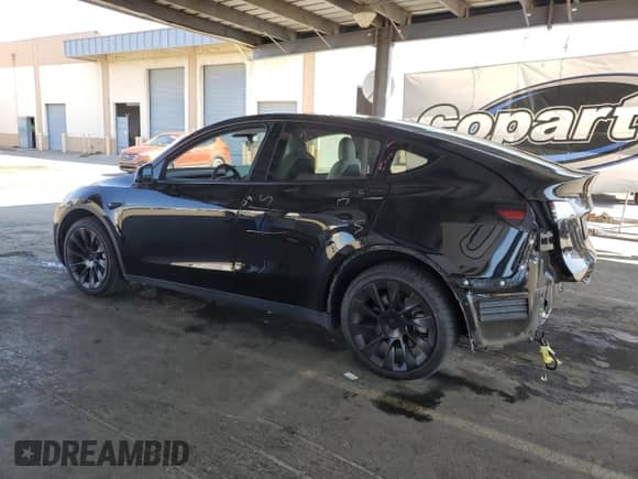 2022 Tesla Model Y Long Range с VIN 7SAYGDEE3NF554235, выставлен на аукционе Copart как лот 80519035 с пробегом 53 742 миль миль и Списание • Salvage title. История ставок и продаж доступна на DreamBid. Изображение 2.