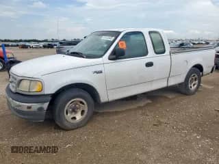 1999 Ford F-150 с VIN 1FTZX1725XNC06556, выставлен на аукционе Copart как лот 67422545 с пробегом Не указан миль и Списание • Salvage title. История ставок и продаж доступна на DreamBid. Изображение 1.