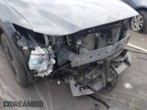 2024 Mazda CX-5 S Preferred z VIN JM3KFBCL8R0508293, wystawiony jako IAAI lot #43069466 z przebiegiem 10 869 mil mil oraz . Historia ofert i sprzedaży dostępna na DreamBid. Obrazek 18.