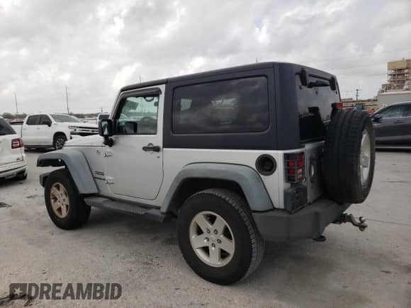 2012 Jeep Wrangler Sport с VIN 1C4AJWAG7CL101619, выставлен на аукционе Copart как лот 49294935 с пробегом 148 469 миль миль и Списание • Salvage title. История ставок и продаж доступна на DreamBid. Изображение 2.