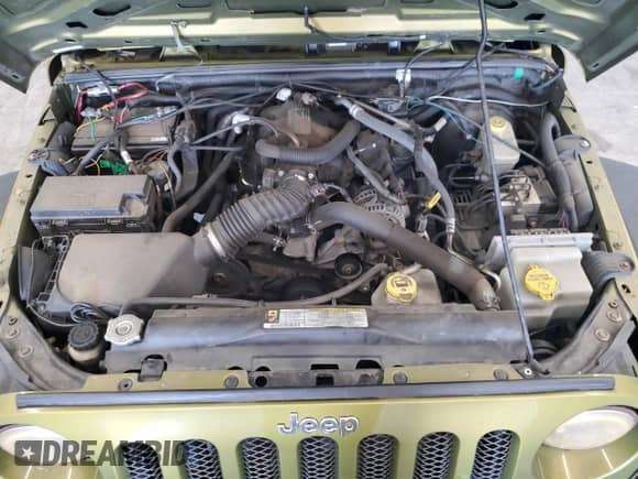 2008 Jeep Wrangler X z VIN 1J4FA24138L627219, wystawiony jako Copart lot #69300975 z przebiegiem 148 448 mil mil oraz Czysty tytuł • Clean title. Historia ofert i sprzedaży dostępna na DreamBid. Obrazek 11.