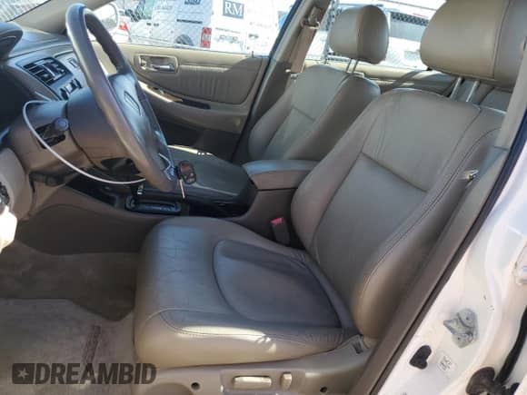 1999 Honda Accord EX with VIN 1HGCG1650XA052672, listed as a Copart auction lot 48684895 with 77,694 mi miles and Salvage title. Bid and sale history available at DreamBid. Image 7.