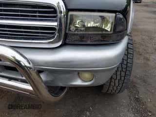 2004 Dodge Dakota SLT z VIN 1D7HG48N34S677100, wystawiony jako IAAI lot #42885294 z przebiegiem Nie podano mil oraz . Historia ofert i sprzedaży dostępna na DreamBid. Obrazek 6.